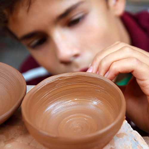 kid-with-bowl Kids Need Clay - kid with ceramic bowl